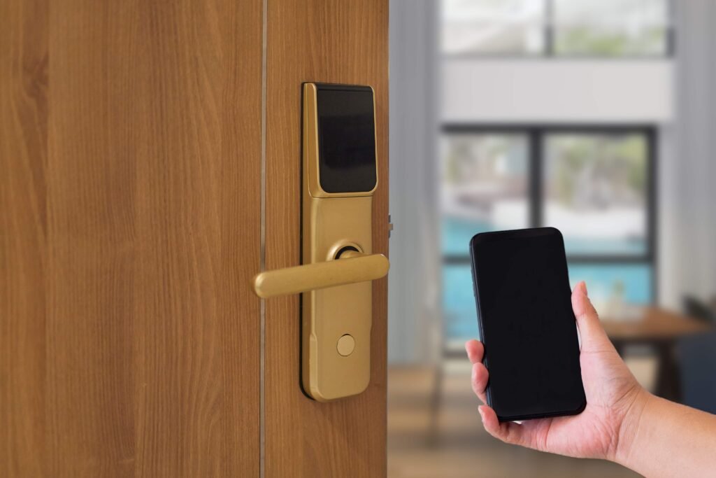 Locksmith testing wifi lock with phone